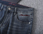 Vintage Embossed Emblem Slim Denim V260822