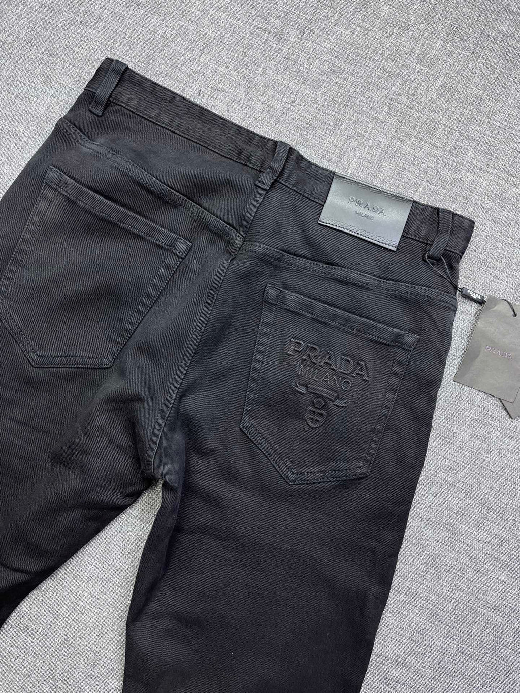 Solid Black Debossed Shield Motif Slim Denim M260716