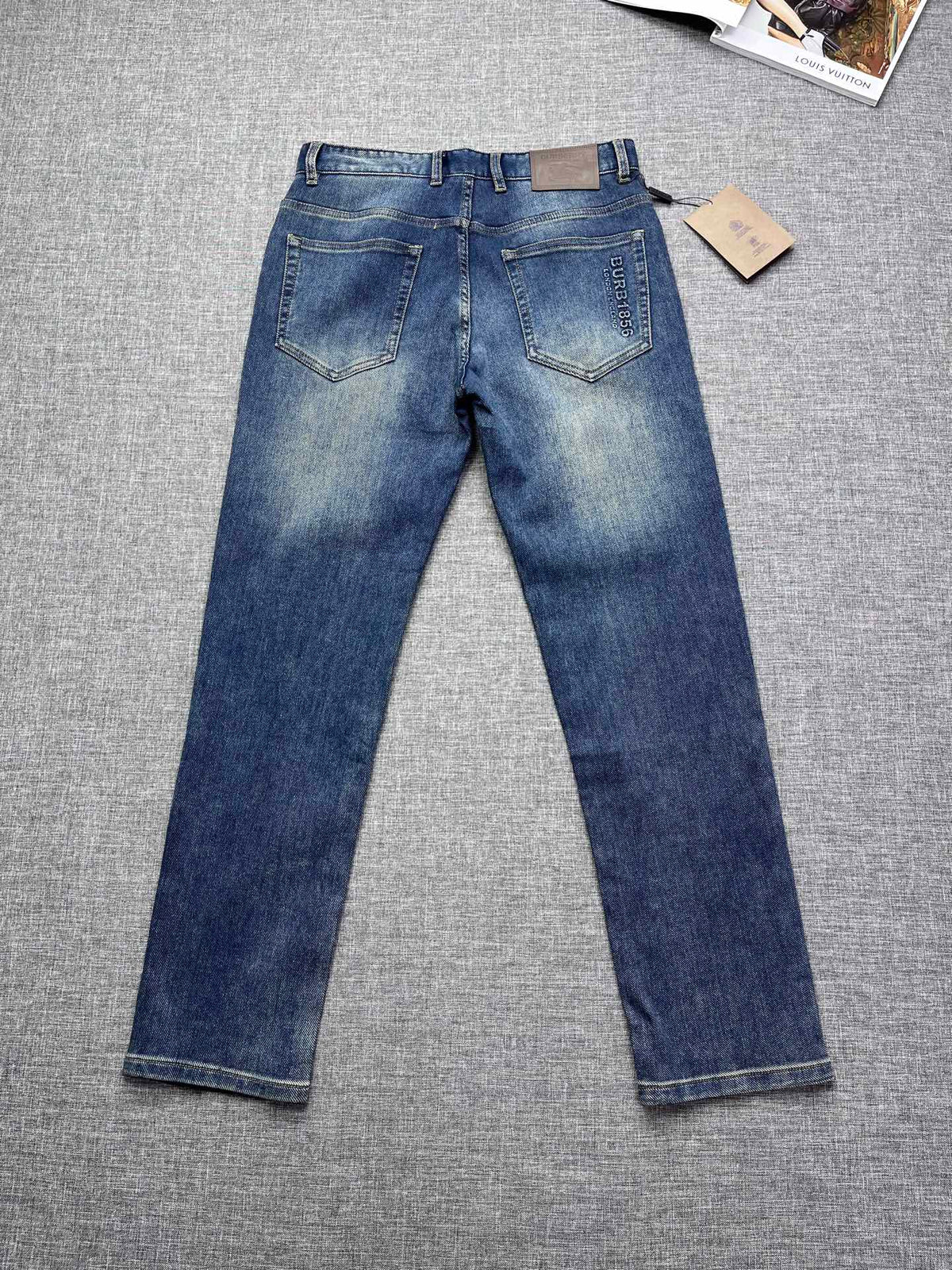 Vintage Fade Blue Embossed Text Jeans M260721