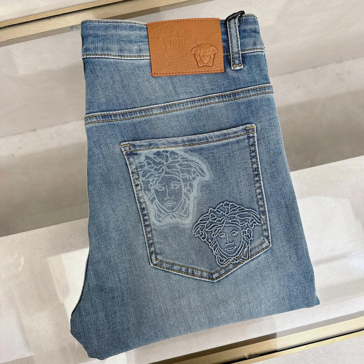 Pale Washed Denim Pants With Dual Portrait Graphic On Back Pocket R260506
