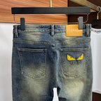 Vintage Faded Dark Wash Yellow Eye Appliqué Slim Jeans C261033