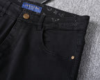 Solid Black Wash Embossed Monogram Jeans V260815