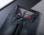 Vintage Embossed Emblem Slim Denim V260822