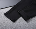 Solid Black Wash Metal Logo Plate Jeans V260814