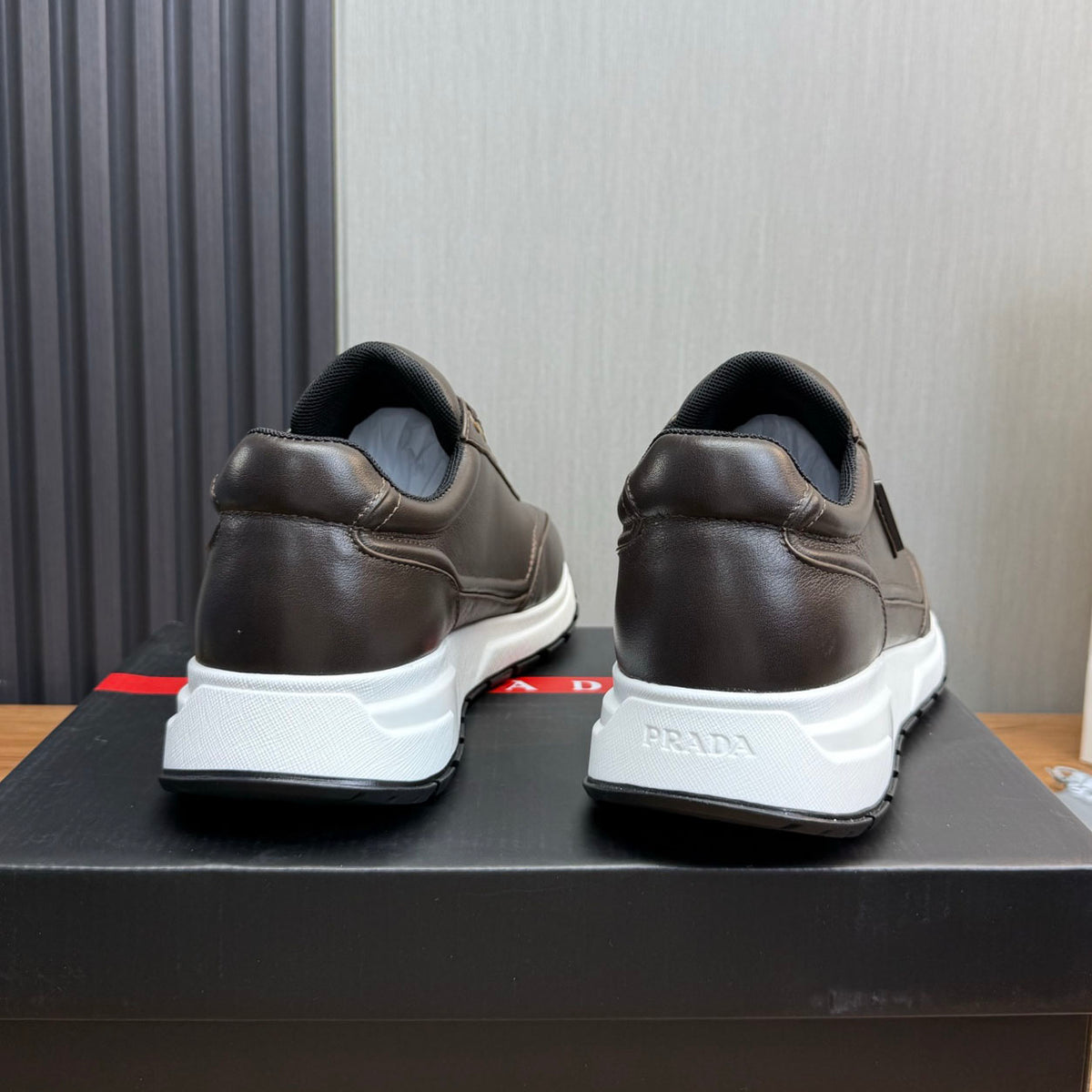 Calfskin Triangle Badge Lace-Up Sneaker S283439