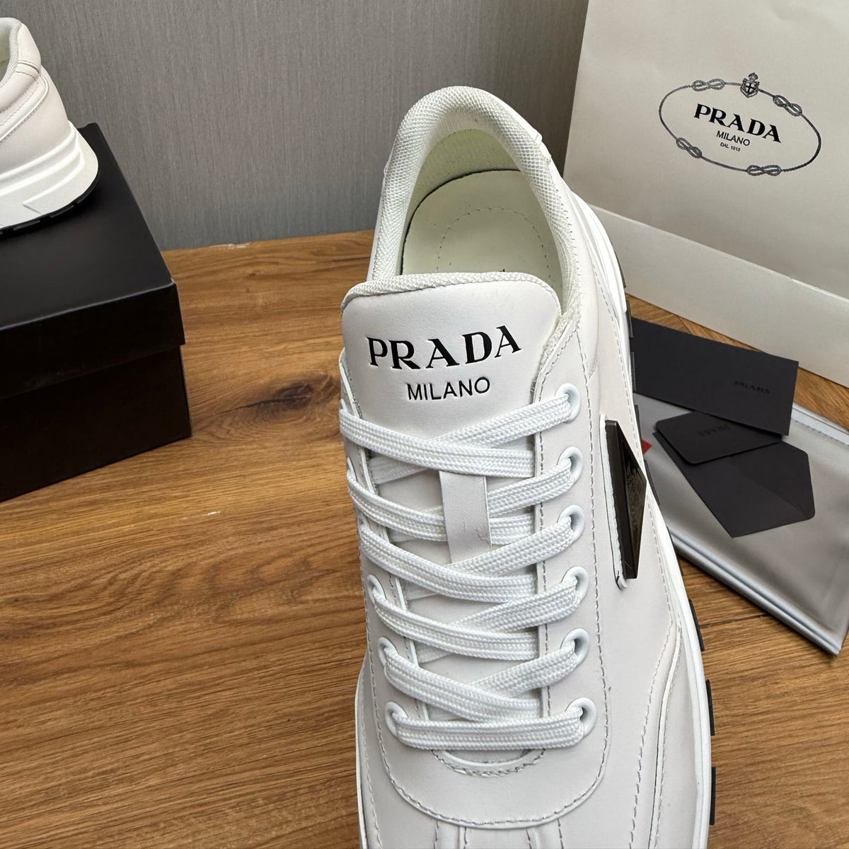 Calfskin Triangle Badge Lace-Up Sneaker S283439