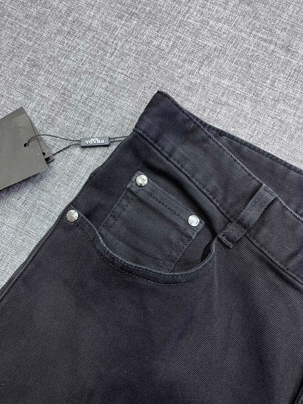 Solid Black Debossed Shield Motif Slim Denim M260716