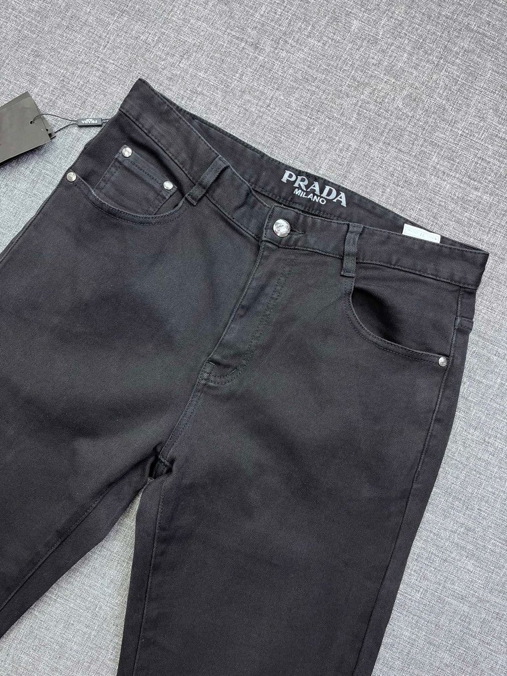 Solid Black Debossed Shield Motif Slim Denim M260716