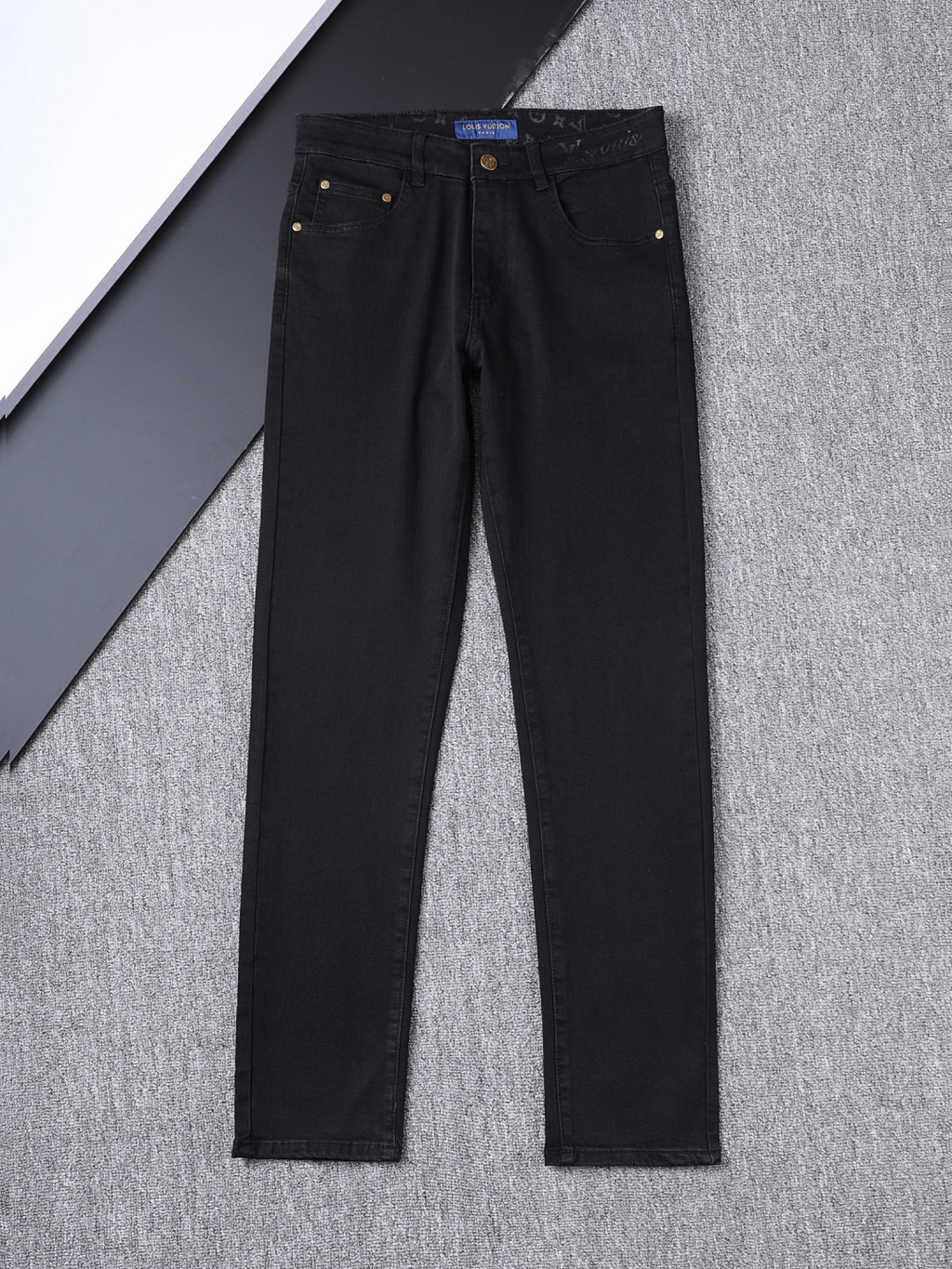 Solid Black Wash Embossed Monogram Jeans V260815