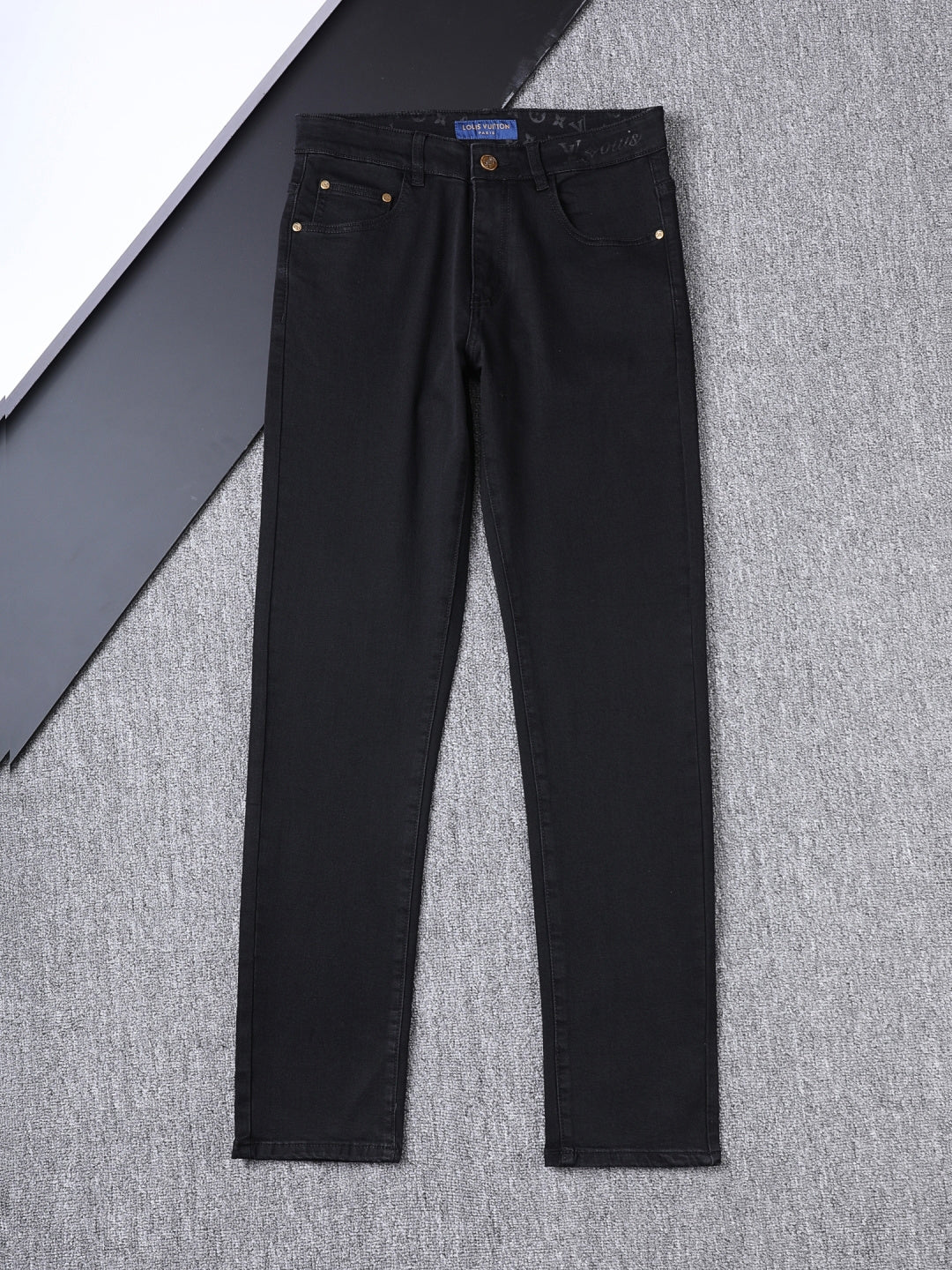 Solid Black Wash Embossed Monogram Jeans V260815