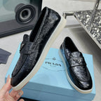Ostrich Grain Metal Triangle Badge Slip-On Loafers S283422