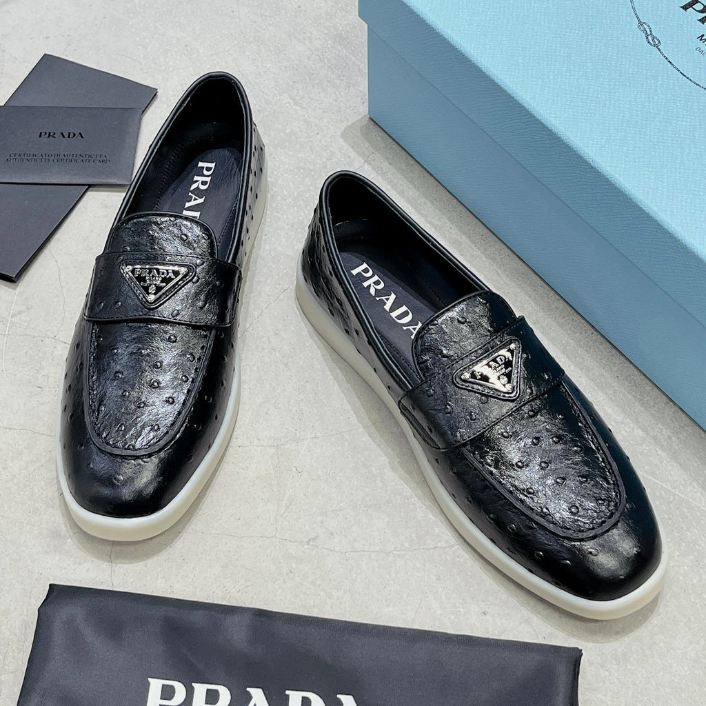 Ostrich Grain Metal Triangle Badge Slip-On Loafers S283422