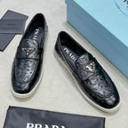 Ostrich Grain Metal Triangle Badge Slip-On Loafers S283422