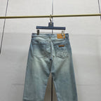 Faded Light Blue Embossed Monogram Slim Denim Jeans M260730
