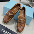 Ostrich Grain Metal Triangle Badge Slip-On Loafers S283422