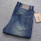 Vintage Fade Blue Embossed Text Jeans M260721