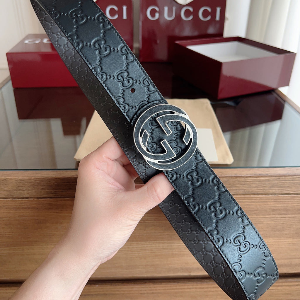 Black Embossed Repeat Pattern Belt With Circular Interlocking Buckle E020809