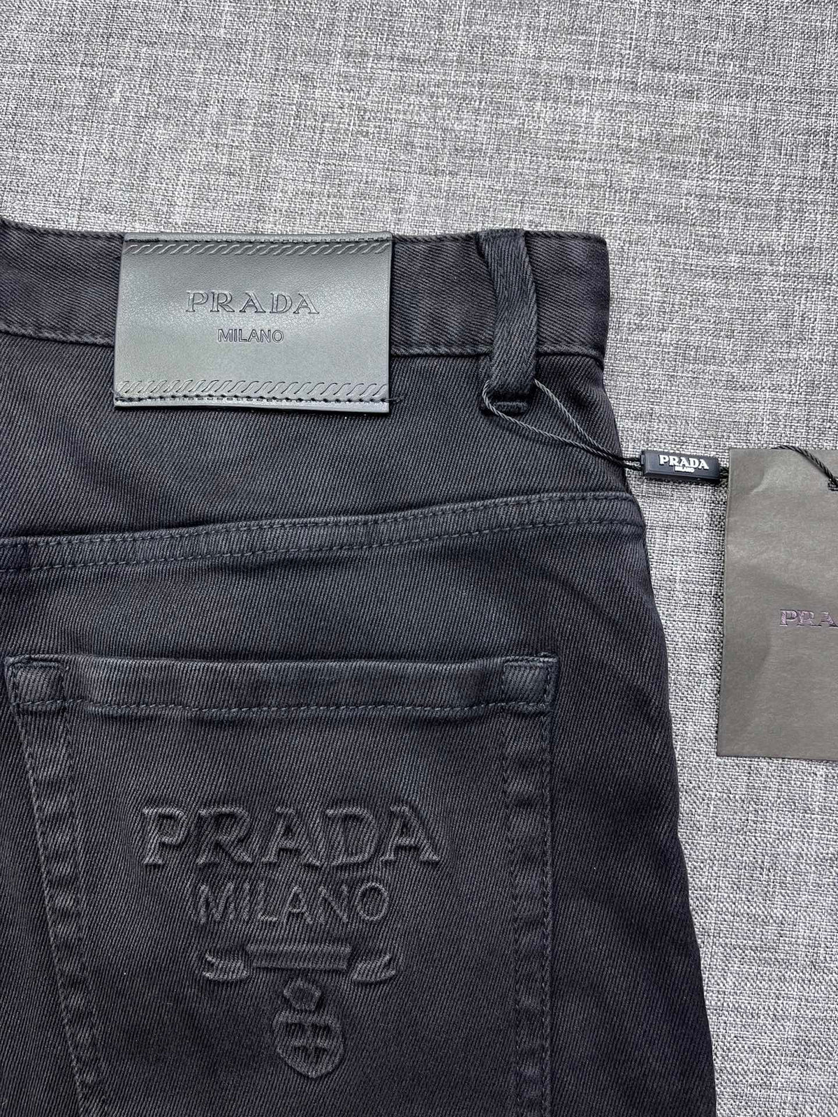 Solid Black Debossed Shield Motif Slim Denim M260716