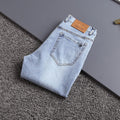Light Blue Faded Minimal Stitch Logo Slim Denim Jeans M260743