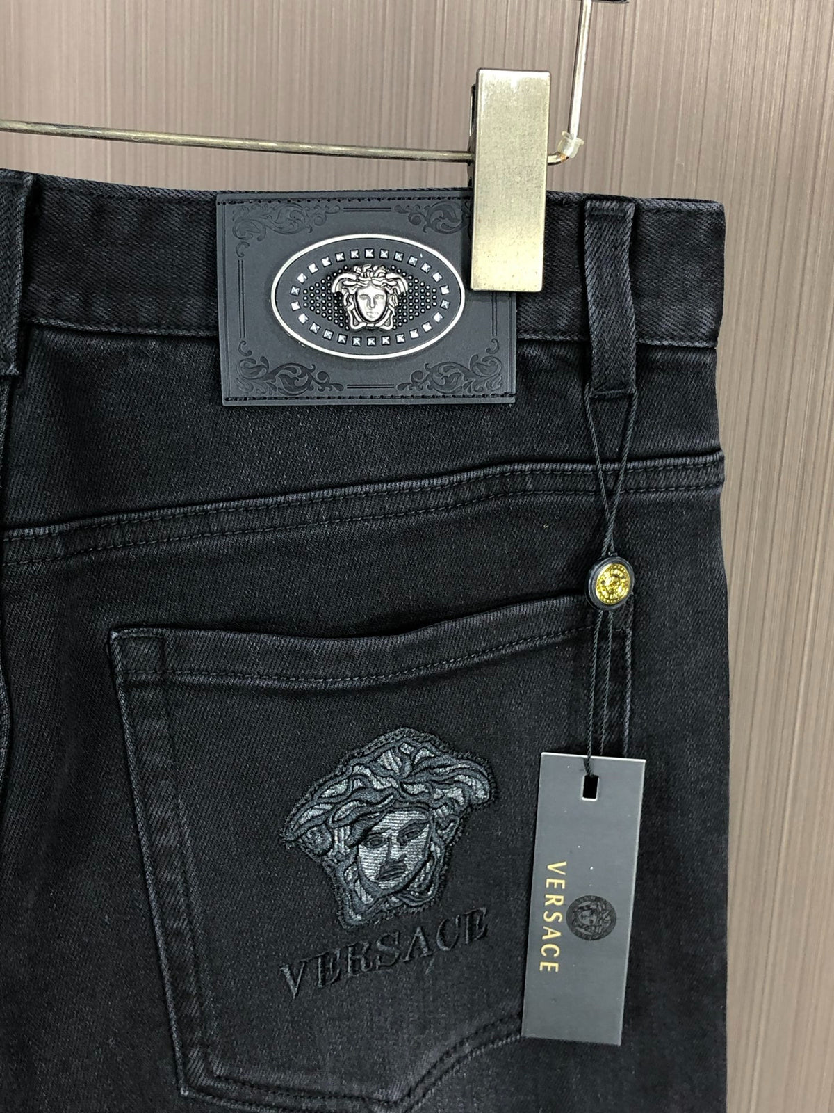 Men Solid Black Embroidered Medusa Slim Denim Pants C261048