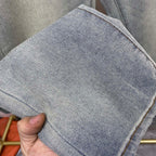 Faded Light Blue Embossed Monogram Slim Denim Jeans M260730