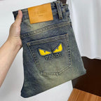 Vintage Faded Dark Wash Yellow Eye Appliqué Slim Jeans C261033