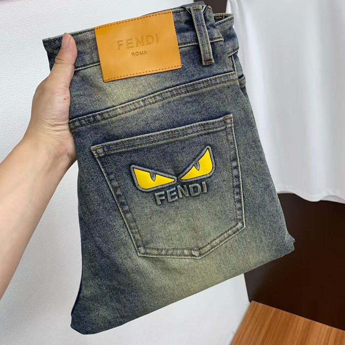 Vintage Faded Dark Wash Yellow Eye Appliqué Slim Jeans C261033