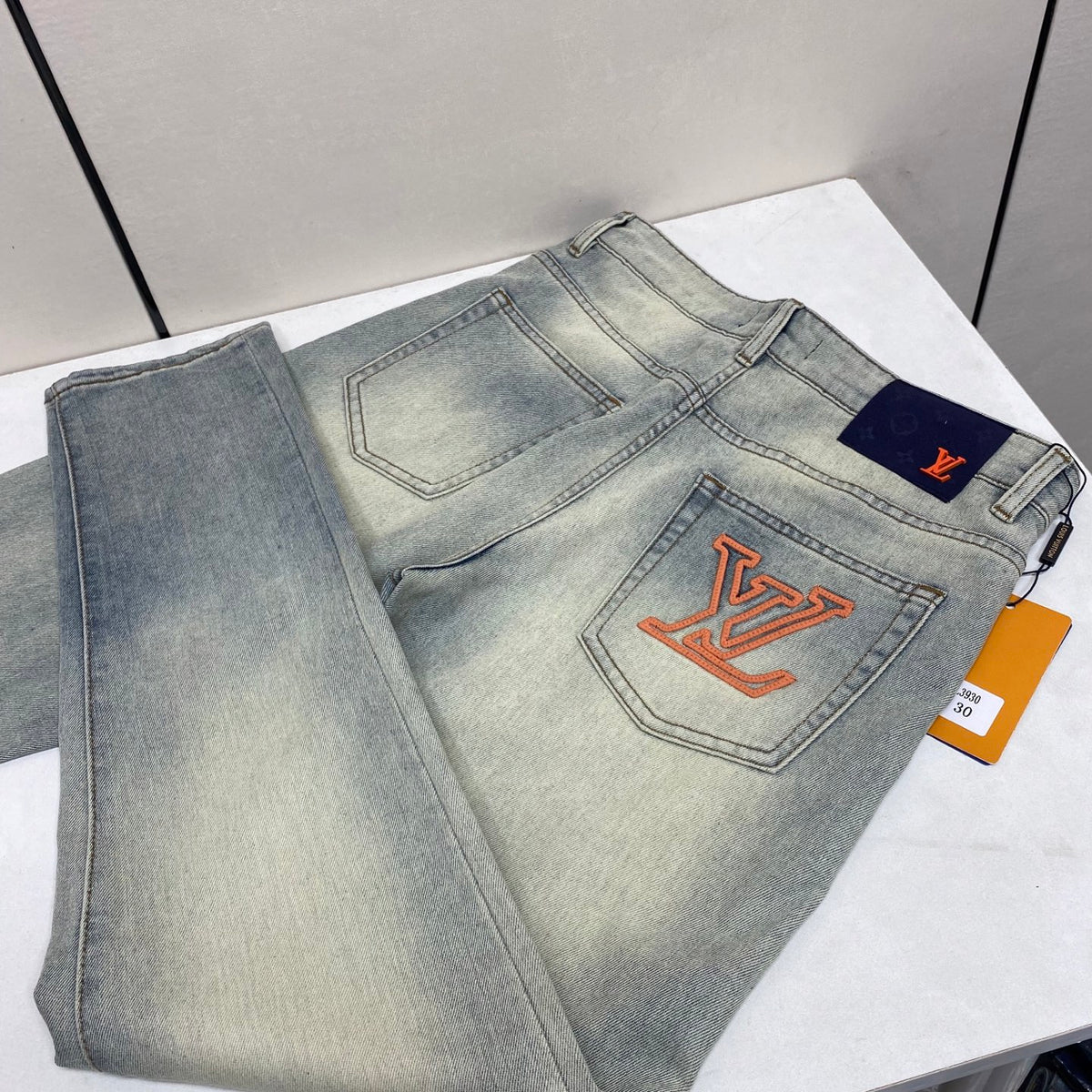 Pale Vintage Fade Orange Logo Jeans E260935