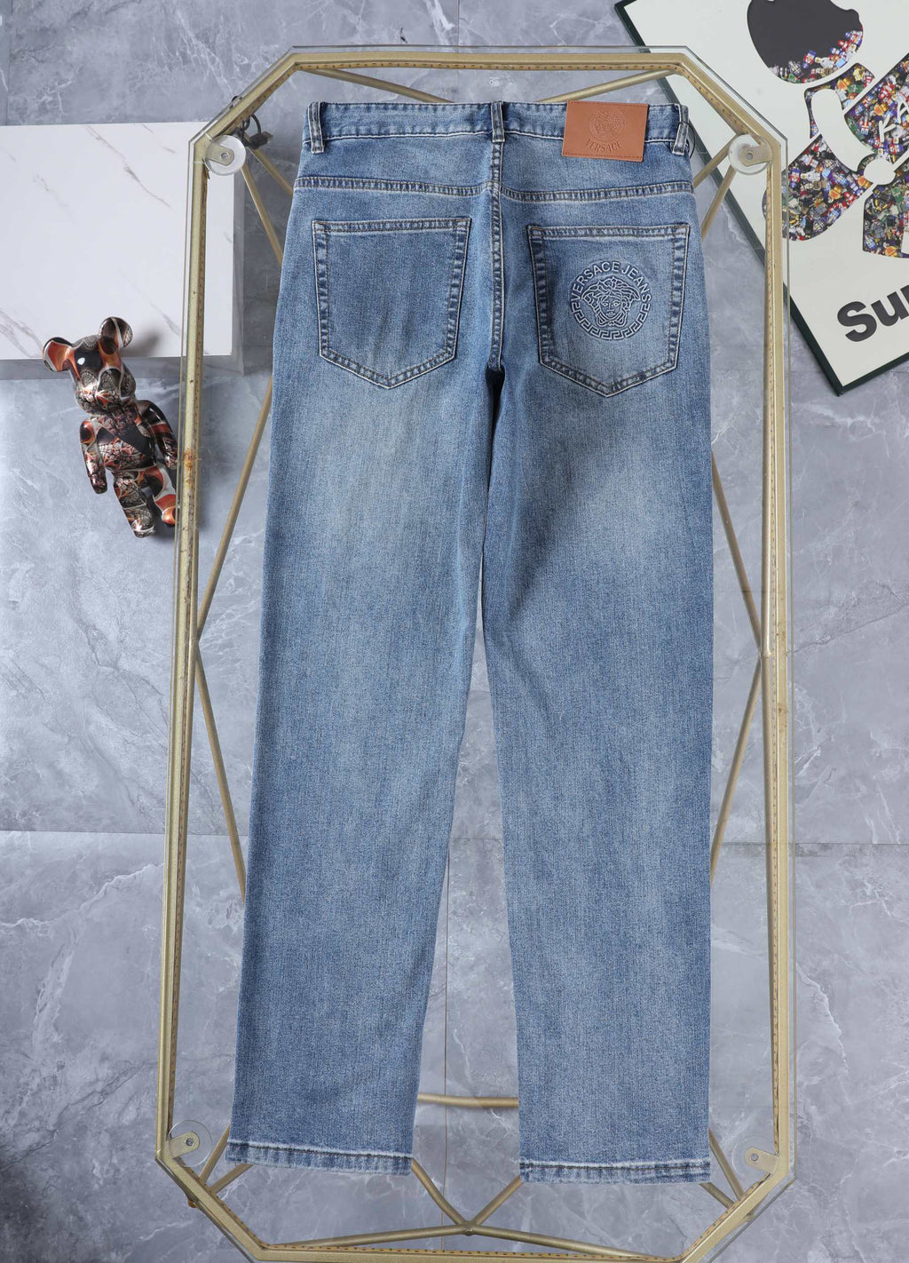 Light Wash Round Medusa Crest Jeans E260918