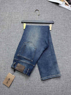 Vintage Fade Blue Embossed Text Jeans M260721