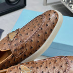Ostrich Grain Metal Triangle Badge Slip-On Loafers S283422