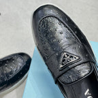 Ostrich Grain Metal Triangle Badge Slip-On Loafers S283422