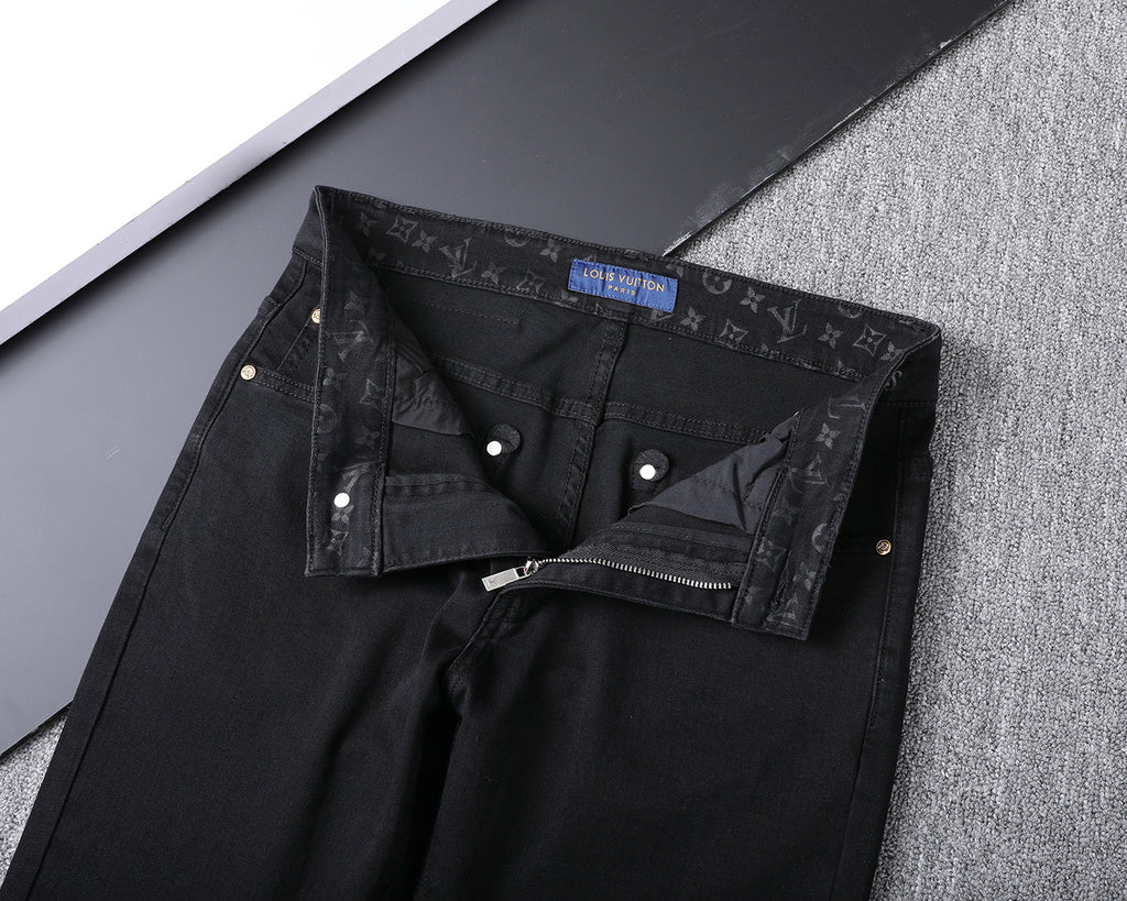 Solid Black Wash Embossed Monogram Jeans V260815