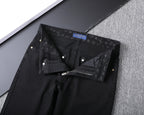 Solid Black Wash Embossed Monogram Jeans V260815