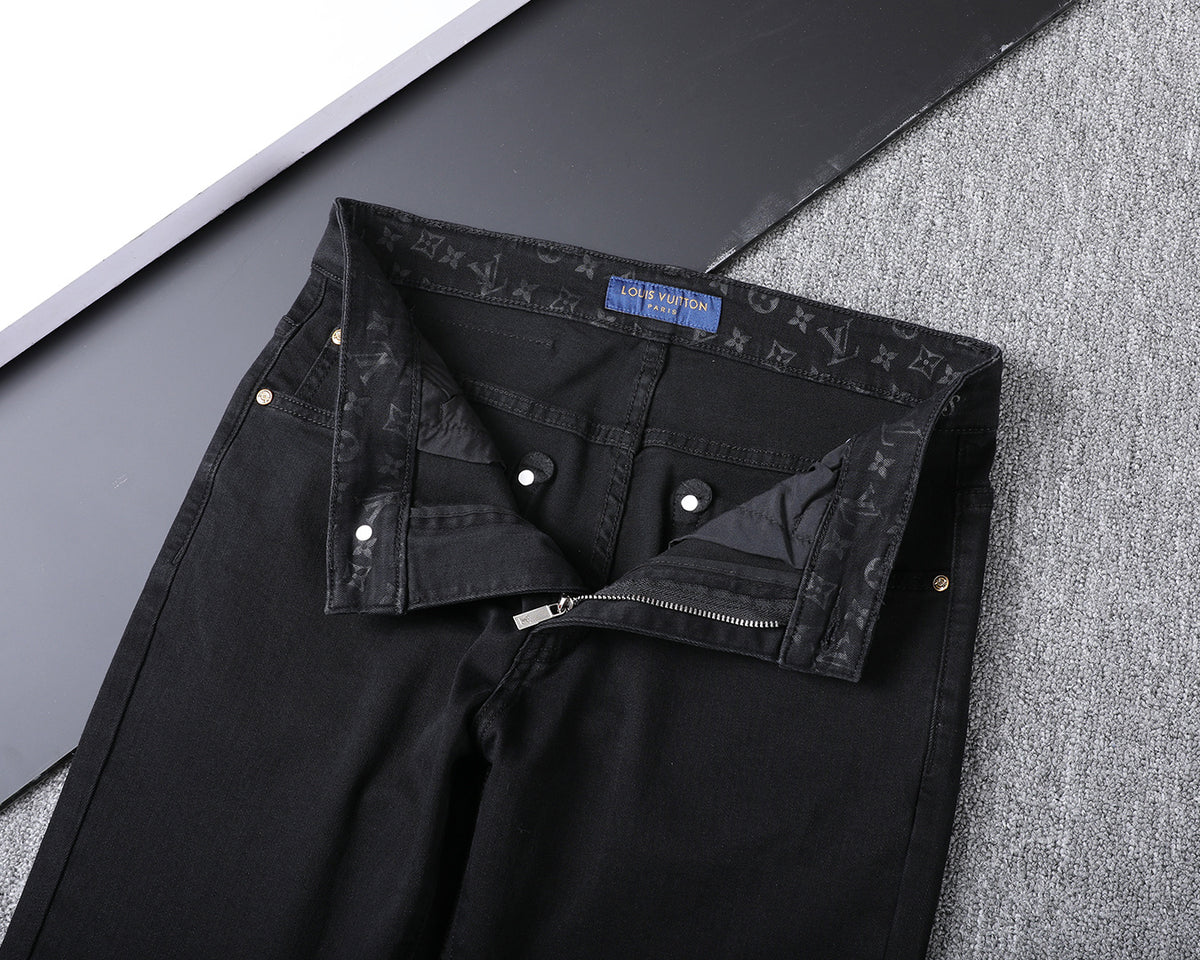 Solid Black Wash Embossed Monogram Jeans V260815