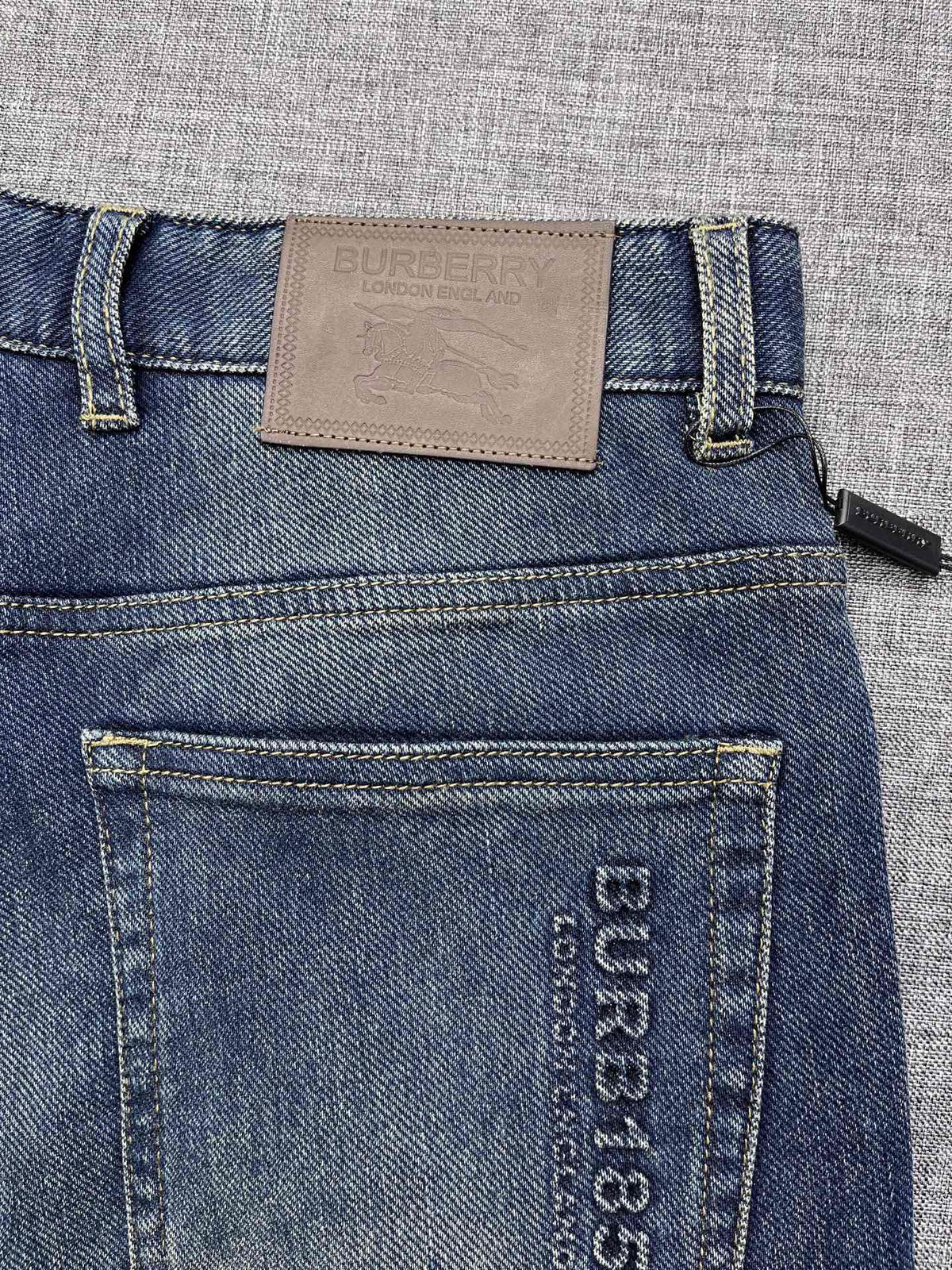 Vintage Fade Blue Embossed Text Jeans M260721