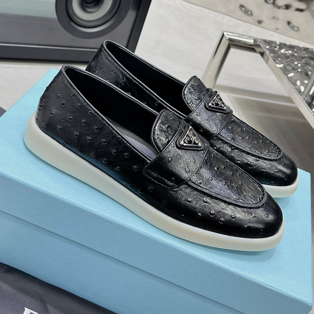 Ostrich Grain Metal Triangle Badge Slip-On Loafers S283422