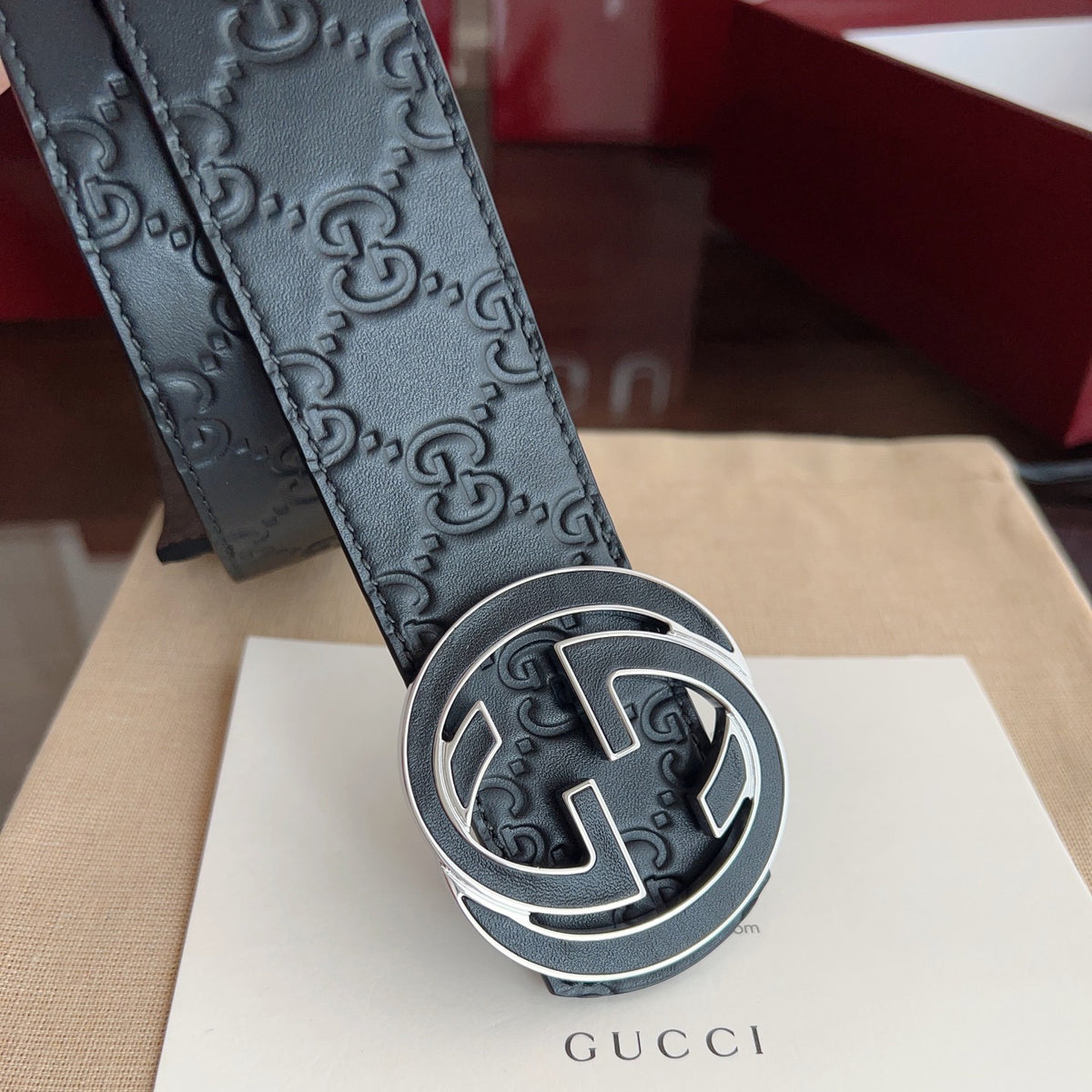 Black Embossed Repeat Pattern Belt With Circular Interlocking Buckle E020809