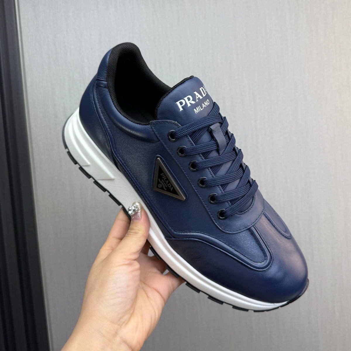 Calfskin Triangle Badge Lace-Up Sneaker S283439