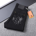 Solid Black Wash Embossed Monogram Jeans V260815