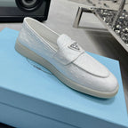 Ostrich Grain Metal Triangle Badge Slip-On Loafers S283422