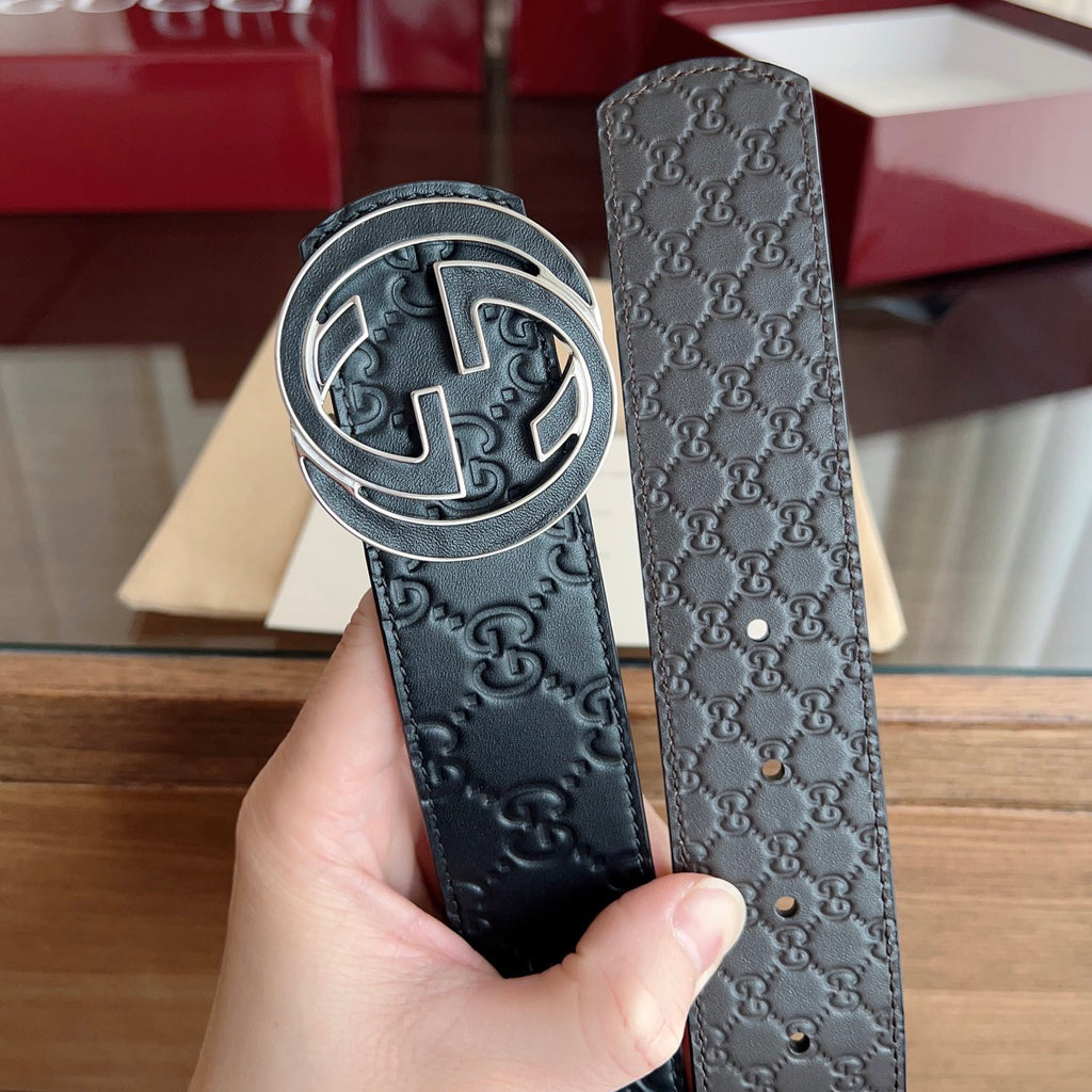Black Embossed Repeat Pattern Belt With Circular Interlocking Buckle E020809