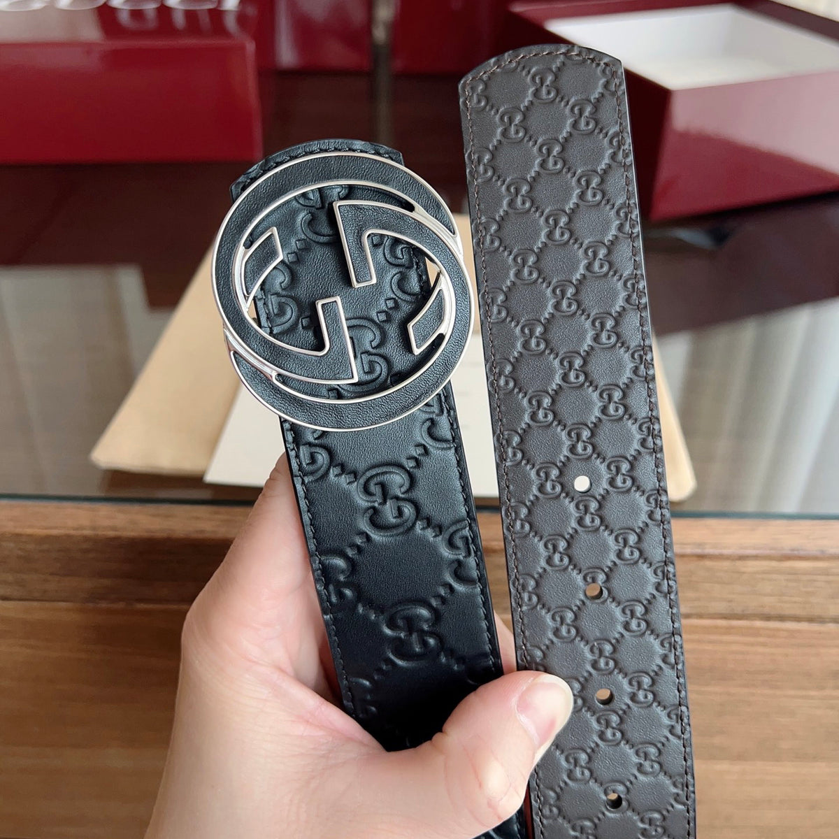 Black Embossed Repeat Pattern Belt With Circular Interlocking Buckle E020809