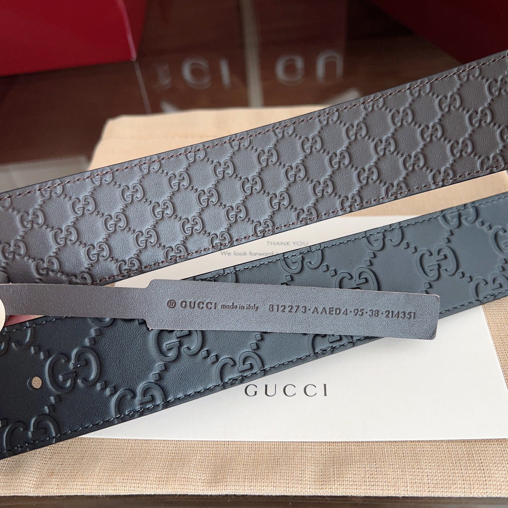 Black Embossed Repeat Pattern Belt With Circular Interlocking Buckle E020809