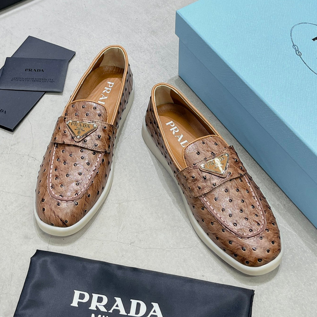 Ostrich Grain Metal Triangle Badge Slip-On Loafers S283422