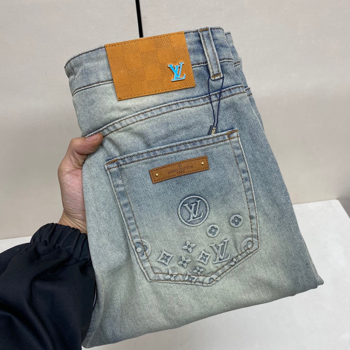 Faded Light Blue Embossed Monogram Slim Denim Jeans M260730