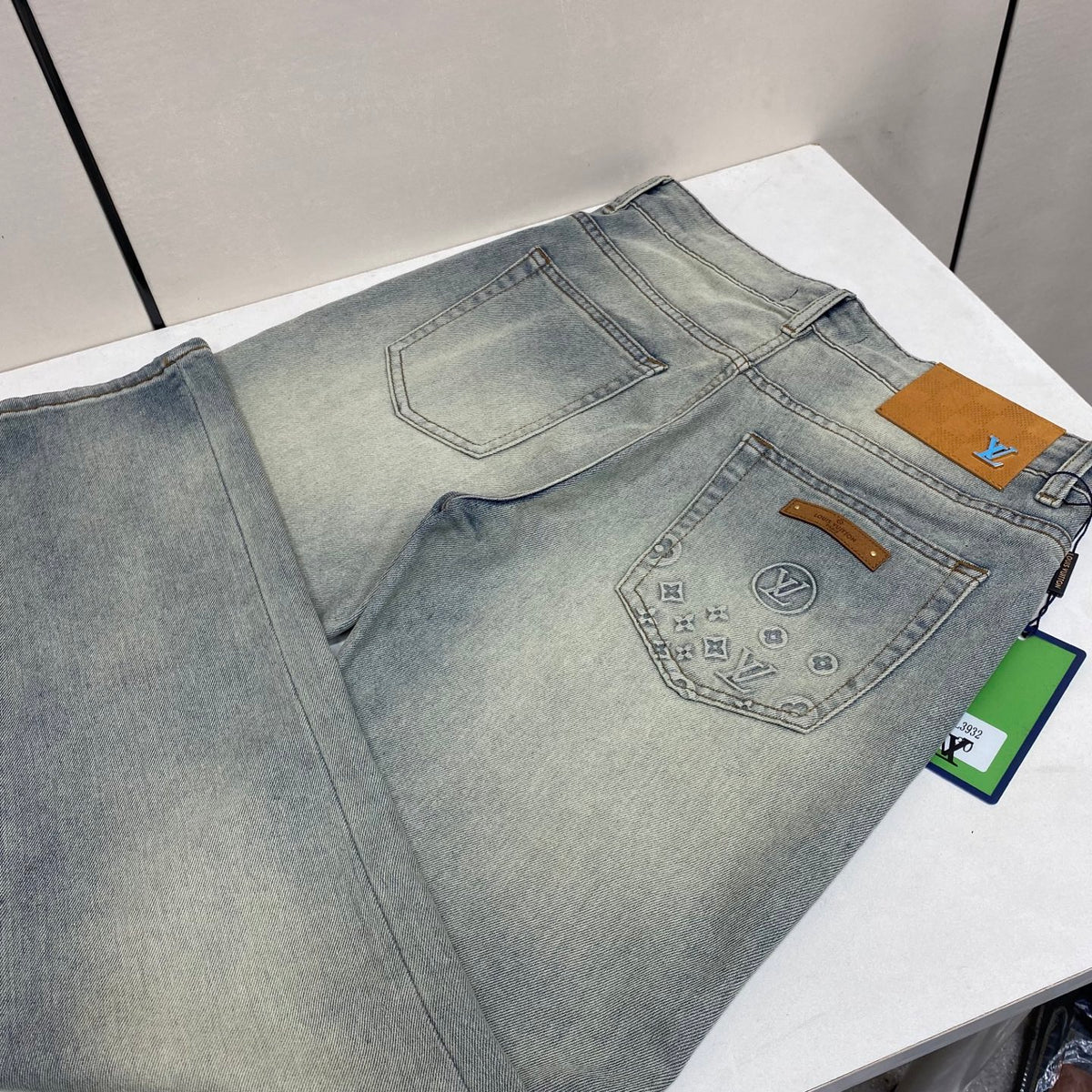 Faded Light Blue Embossed Monogram Slim Denim Jeans M260730
