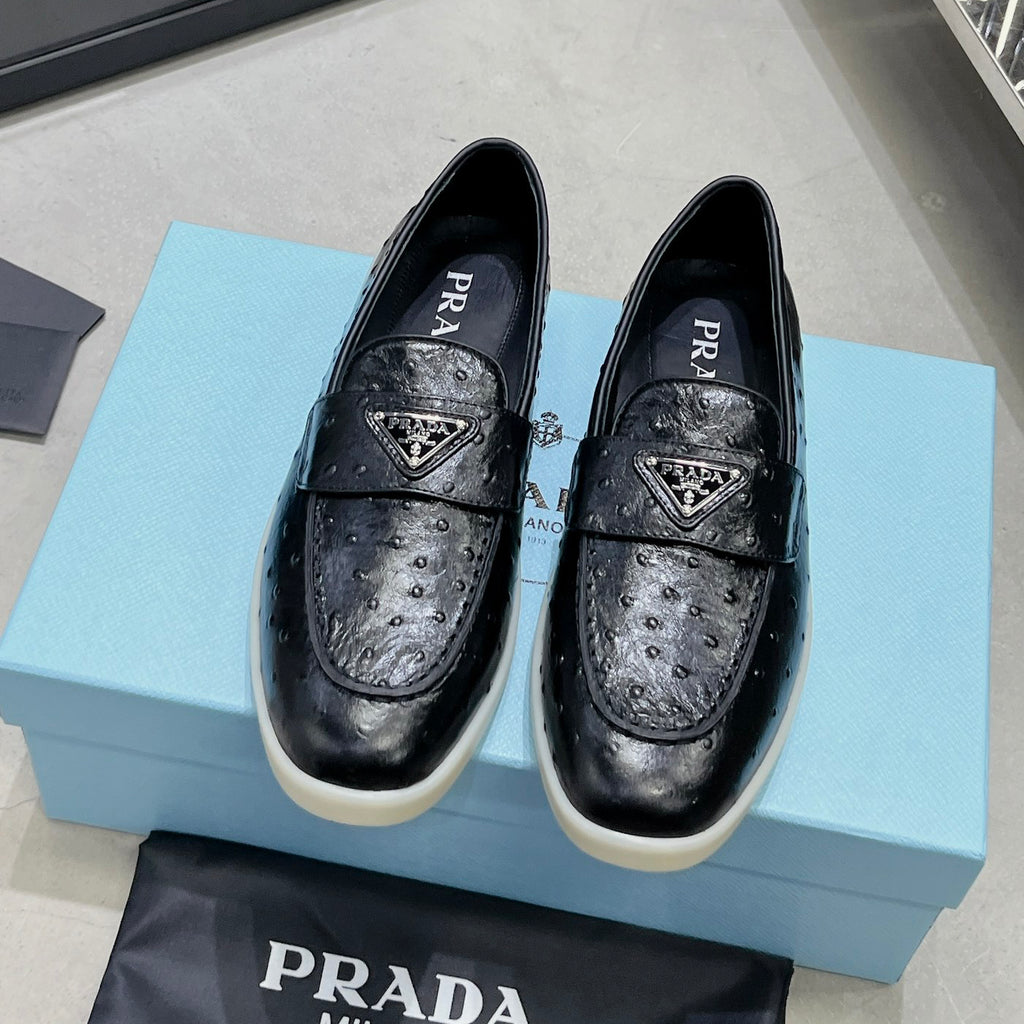 Ostrich Grain Metal Triangle Badge Slip-On Loafers S283422
