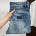 Vintage Faded Blue Leather Patch Jeans E260943