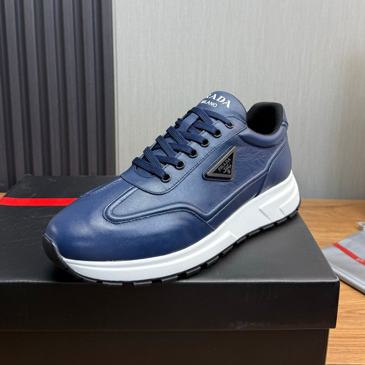 Calfskin Triangle Badge Lace-Up Sneaker S283439